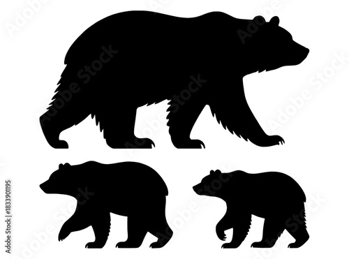A collection of three walking bear silhouettes in different sizes. Vector graphic icon set of a grizzly or black bear isolated on a white background