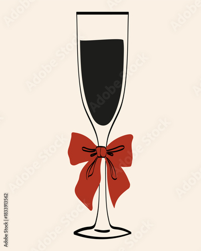 Stylish glass with dark beverage decorated with red bow, perfect for festive celebrations and gatherings