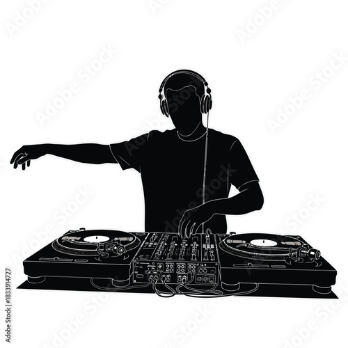 Silhouette of a dj mixing music on turntable and mixer
