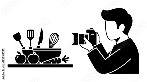 Food photographer capturing ingredients and utensils with camera