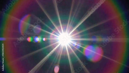 Bright starburst lens flare effect with rainbow aberration