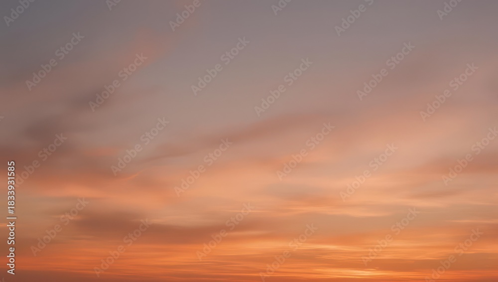 Fototapeta premium Vibrant Sunset Sky with Orange and Purple Hues.