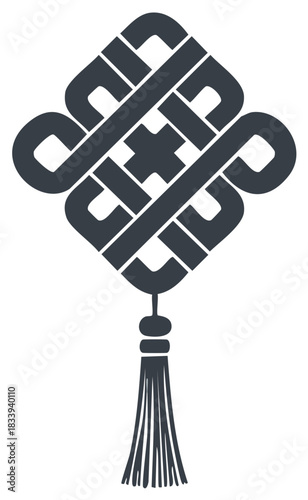 Intricate Chinese knot ornament with tassel for good luck and fortune