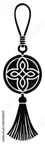 Elegant tassel pendant featuring a Celtic style ornament in black and white