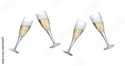 A collection of champagne glasses, flutes, tilted with fizzy wine as a birthday or New Year celebration with fizzy frothy bubbles with different fill levels isolated on a transparent background.