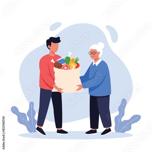 Young man giving a bag of groceries to an elderly woman as a volunteer for a food donation charity organization.