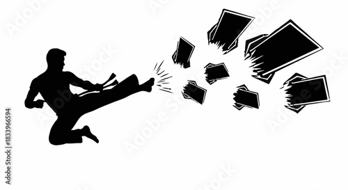 Martial artist powerfully kicks through stacked boards, demonstrating strength and discipline.