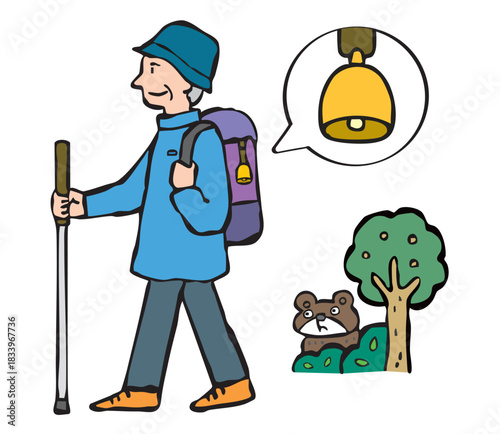 熊よけの鈴をつけて山登りをする男性（シニア）