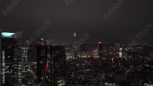 Wallpaper Mural Panoramic aerial view of Frankfurt skyline at night. City's illuminated skyscrapers creating a modern cityscape in Germany's financial hub Torontodigital.ca