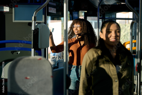 Woman paying ticket for public transport commute