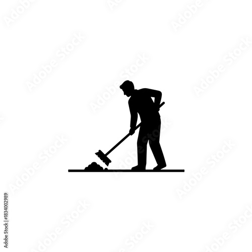 worker sweeping road silhouette