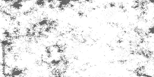 Abstract grunge background with vintage black ink splatters and a dirty paper texture featuring a dark spray paint pattern and artistic vector brush splashes