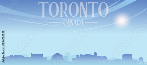 Blue panoramic poster of the city skyline with misty background buildings and clouds of TORONTO, CANADA