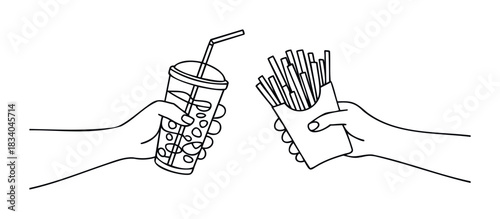 Human hands hold popular fast food items a cold drink with straw and french fries in a container perfect for food advertising and unhealthy eating themes