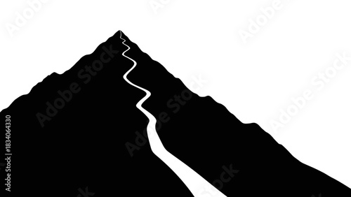 A winding path leading to the summit of a mountain silhouette.