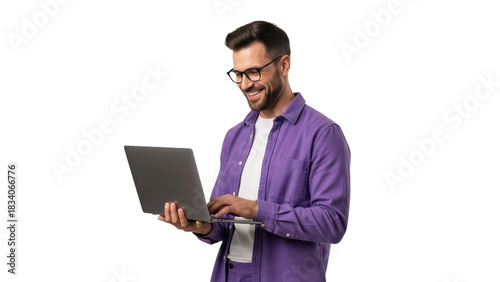Happy man in purple shirt using laptop