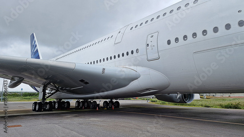 double-decker commercial aircraft with large cargo capacity for passengers and tourists on the airport tarmac