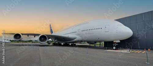 double-decker commercial aircraft with large cargo capacity for passengers and tourists on the airport tarmac