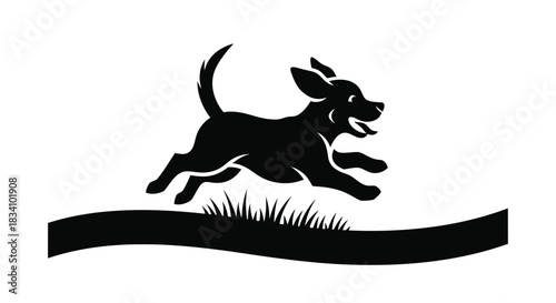 Joyful silhouette of a happy dog running through grass with a wagging tail.