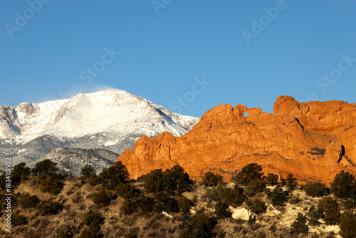 Snow Capped Pikes Peak Mountain and the rock formation Kissing Camel