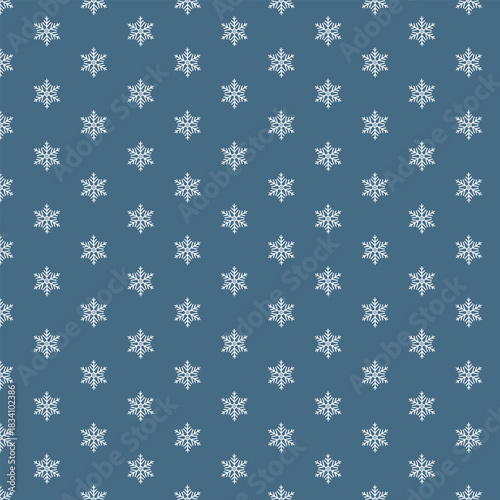 Snowflake pattern on a blue background. New Year's print.
