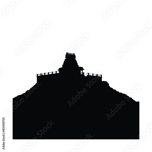 Ancient temple architecture silhouette on a hillside