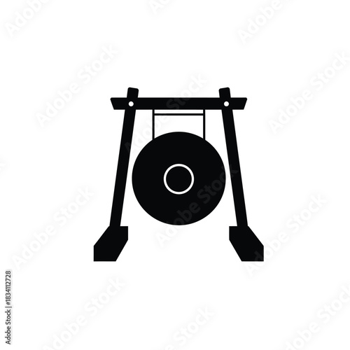 Traditional asian gong on a wooden stand silhouette
