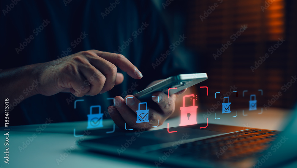 Naklejka premium Cybersecurity concept showing man using smartphone with security icons, representing data protection, online privacy, mobile security breach and internet safety awareness.