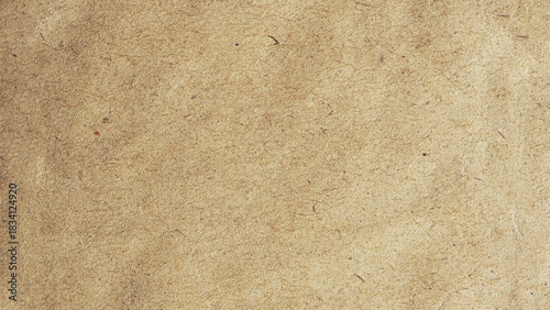 Brown paper background. Abstract brown recycled paper background. Old Kraft paper texture box craft stripes pattern.
top view.