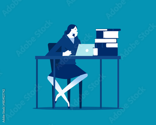 Thinking. Woman sit in thoughtful pose at working desk with books.