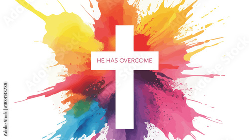 White christian cross with the words he has overcome against a vibrant explosion of colorful watercolor paint splatters