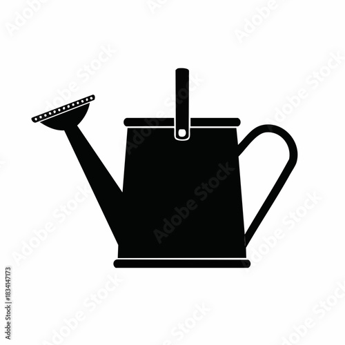Black silhouette of a watering can with a spout and handle on a white background