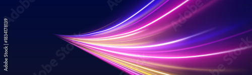 Fotografija Fast-moving neon streaks form spiraling patterns