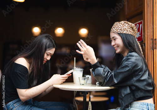 Photography Two young asian woman gen z using smartphone share lifestyle happiness travel mo