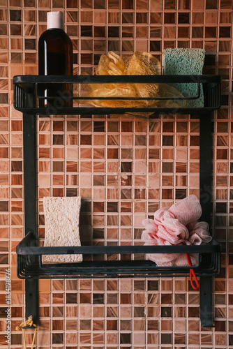 Clean and modern shower caddie with various toiletries and bath products. Mockup template bottles at home bathroom.