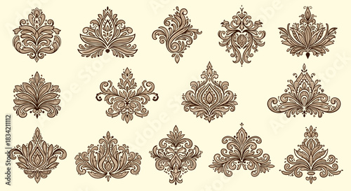 Collection of ornate vintage damask and floral design elements in a monochrome style, ideal for elegant decorative projects.
