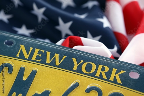 USA state of New York license plate on US flag. Concept of driving in New York. Reaching a driving permit