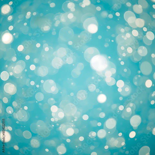 Abstract turquoise background with bokeh effect, creating a dreamy and ethereal atmosphere