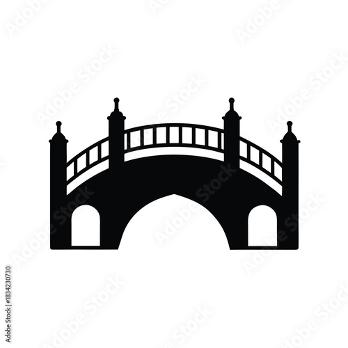 Silhouette of ornate bridge structure spanning gap with architectural design style