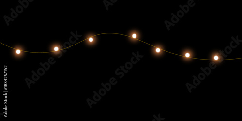 An elegant string of warm, glowing fairy lights arranged in a gentle wave pattern against a solid black background.