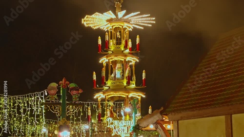 Colmar, France - 3.12.2025: A Christmas fair with entertainment and attractions for children and adults with beautiful illuminations in Colmar