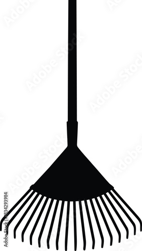 Black silhouette of a leaf rake