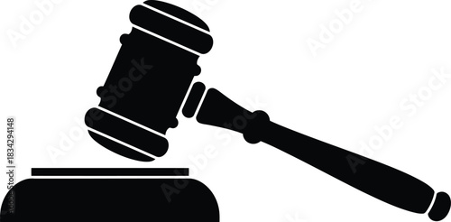 Gavel and sounding block silhouette icon