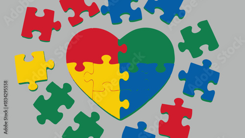 A heart formed by colorful puzzle pieces surrounded by more scattered pieces on a grey background, symbolizing autism awareness and understanding.