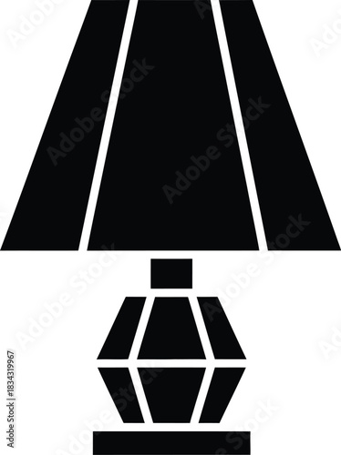 Classic black silhouette of a table lamp with a tapered shade and faceted base