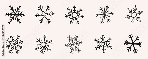 Crayon wax vintage Christmas snowflake collection featuring crystal winter shapes, line art details and decorative seasonal elements. Festive vector snowflakes is perfect for holiday card, packaging