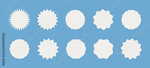 Circle sticker set. Wavy edge promo badges in color Cloud Dancer. Star burst shape tags for price. Blank sale stickers. Flat vintage labels. Simple silhouette. Graphic illustration in trendy colour.