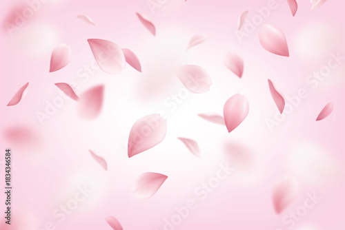 Soft pink falling petals background in delicate romantic style.