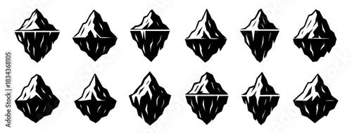 Silhouettes of floating icebergs with strong angular geometry. Each iceberg has defined peaks and deep underwater mass