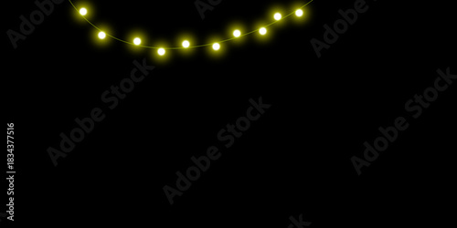 A decorative string of glowing yellow lights hanging in a gentle arc against a solid black background.